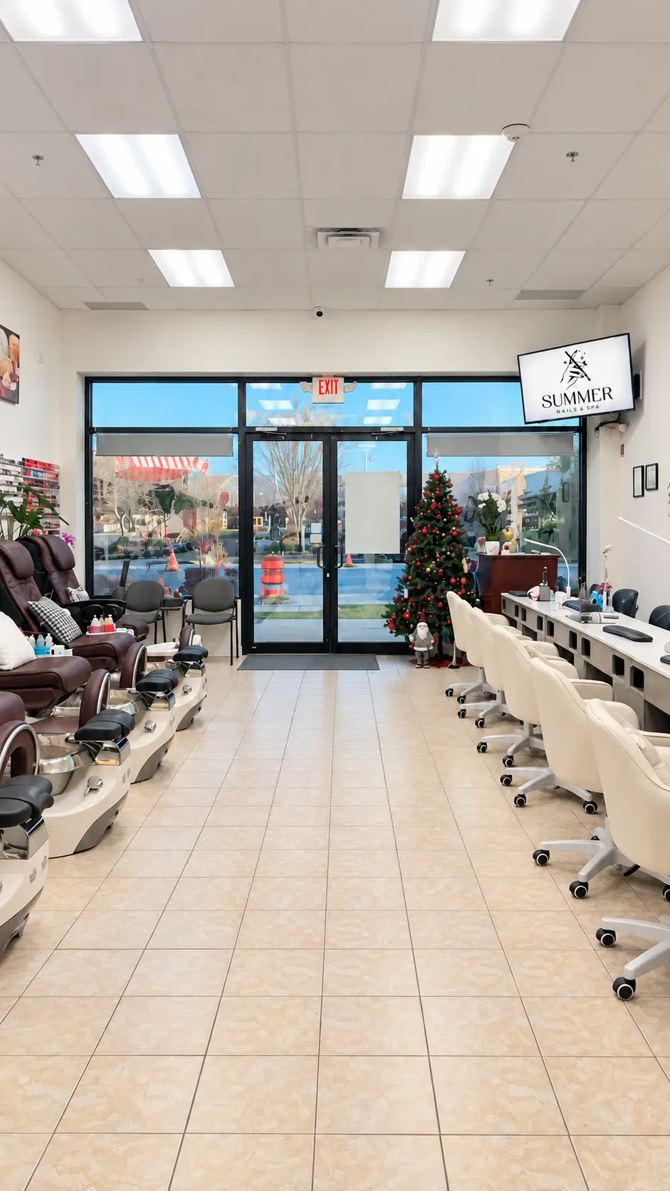 Inside Summer Nails and Spa — pedicure chairs, nail stations and the entrance doors