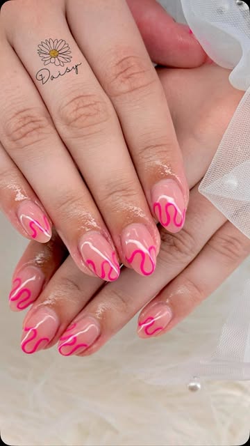 Soft pink nails with hot pink swirl line art