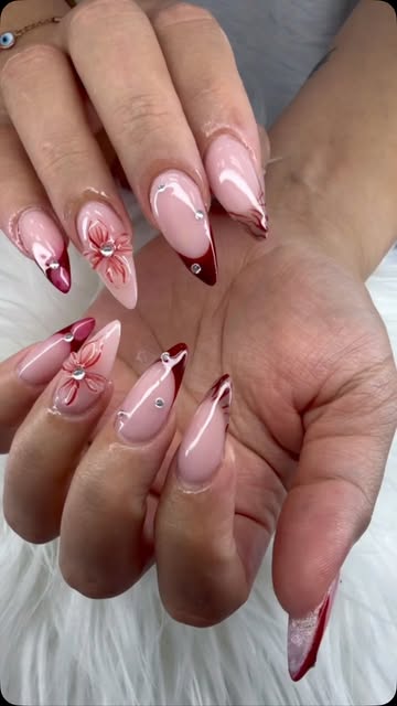 Red French tips with 3D flower nail art